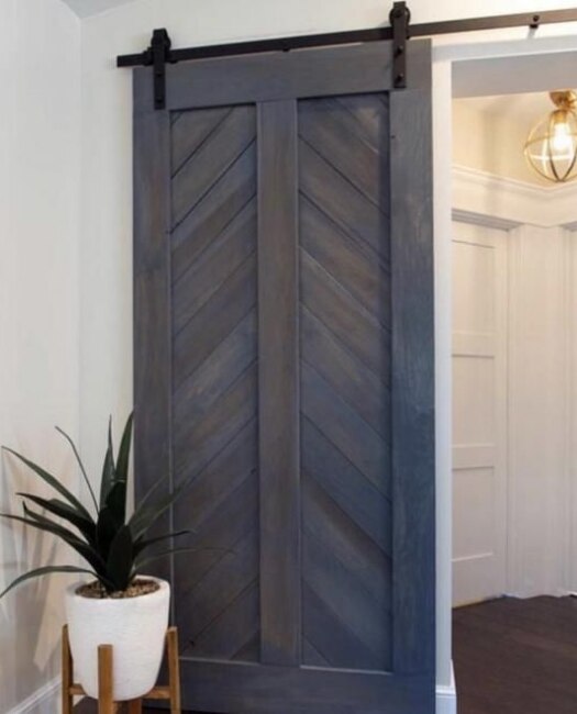 foyer chevron dark blue stain sliding barn door