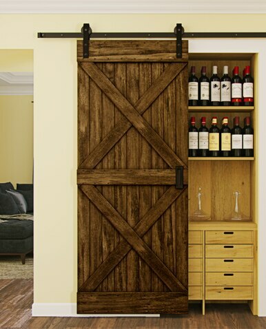 newport wood pantry barn door with double x board and batten design