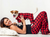 matching set of red plaid human and dog pajamas