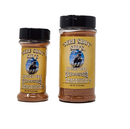 Sure Shot Sid's Honey BBQ Gunpowder Seasoning is a versatile, smoky, and sweet dry rub designed to enhance the flavor and appearance of meats and vegetables, It is a popular multipurpose BBQ rub from the creator of the original Gunpowder seasoning, suitable for everything from pork and chicken to burgers, eggs, and popcorn.