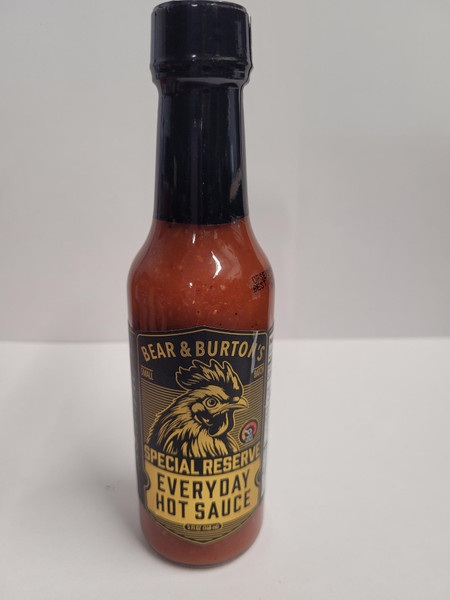Bear & Burton’s EVERYDAY Hot Sauce is exactly what it sounds like—the one you’ll reach for no matter what’s on the menu. Made from a bold cayenne pepper mash and distilled vinegar, it’s built for flavor first, with just the right amount of heat to keep things interesting. No high-fructose corn syrup, no artificial coloring—just a clean, all-natural kick that won’t overpower your food.

This is the hot sauce that plays well with everything. Wings? Of course. Eggs? A no-brainer. Tacos, pizza, burgers, grilled meats—if it needs a boost, EVERYDAY Hot Sauce is up for the job. Keep it on the table, in your bag, and anywhere else flavor emergencies happen.