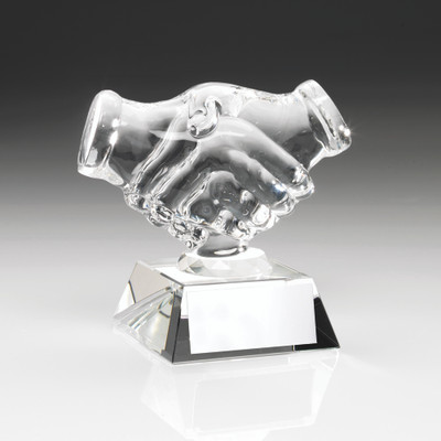 A magnificent clear glass handshake trophy. This award includes FREE personalised engraving.