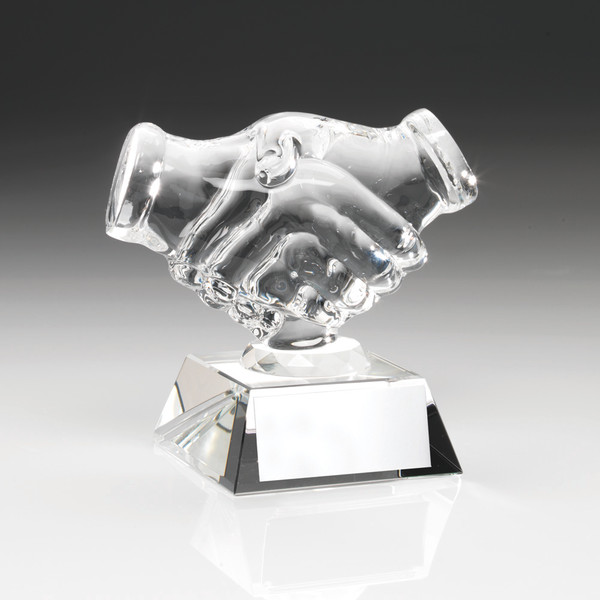 A magnificent clear glass handshake trophy. This award includes FREE personalised engraving.