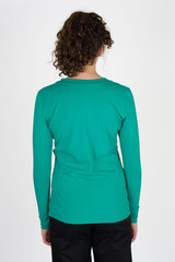 Tall woman wearing Redwood Clothing Ava Crew Top in Emerald back view