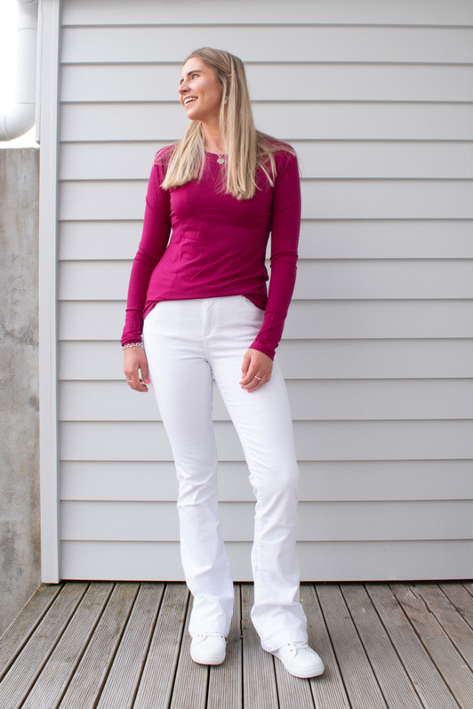 Tall woman wearing Fallon jeans in White by LTB Jeans. Front view