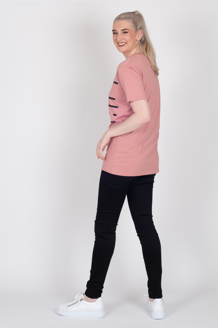 Tall woman showing length of Style X Lab Crossing The Lines Tee with Storm Tuxedo Pants