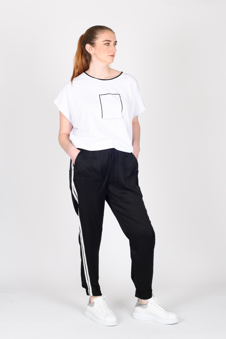 Women's pants with store stripe down side