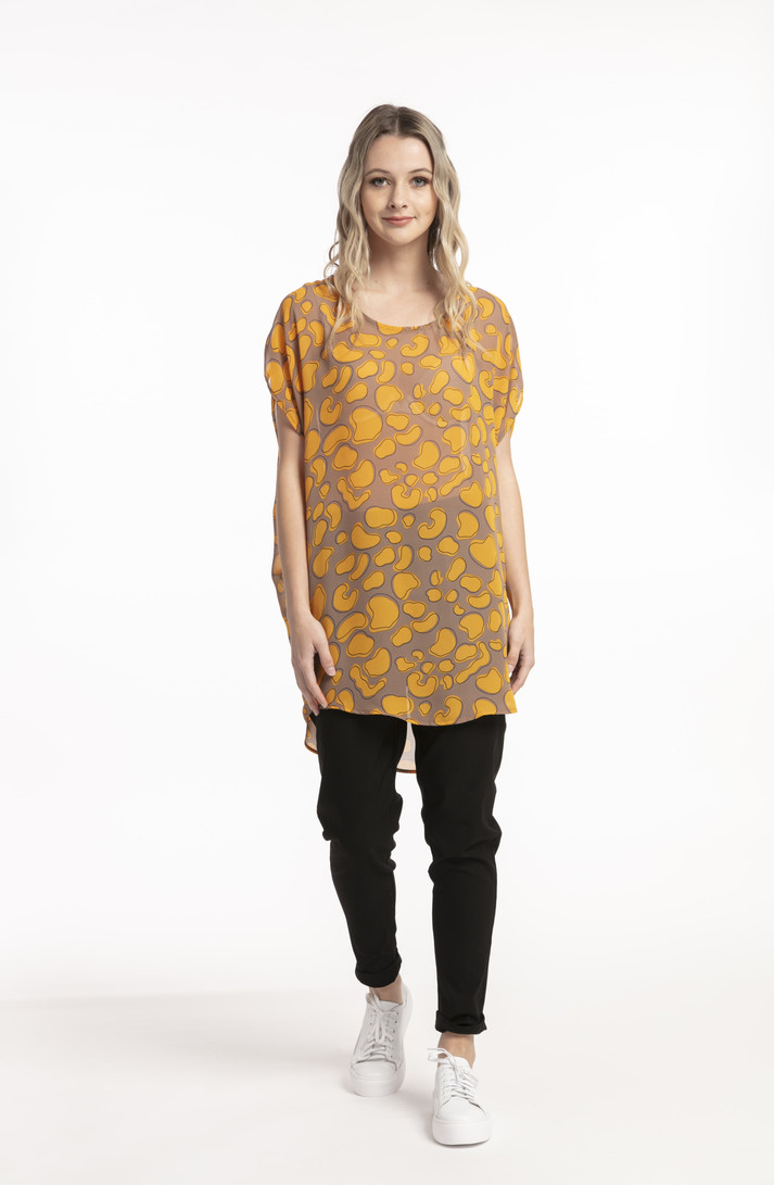 Tall woman wearing Style X Lab Games Top Yellow print