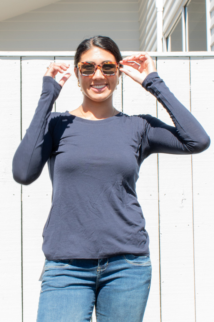 Tall Woman wearing Redwood Clothing Klara top Navy Front view light