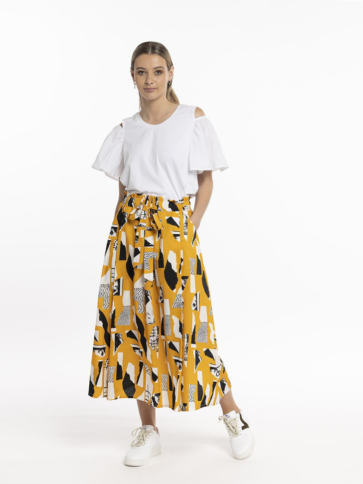 Model in Style X Lab Expression Skirt Yellow Print made longer for tall women