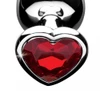 Close-up of crimson red heart gem base on Booty Sparks anal plug