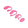 Three Together Ménage à Trois hot pink ribbed vibrating eggs lined up to show graduated diameters of 34 mm, 35 mm, and 38 mm.