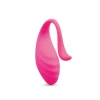 Close-up of small Together Ménage à Trois hot pink silicone egg showing the ribbed texture and retrieval cord.