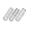 All three Crystal Trio strokers lined up: textured, spiral, and ribbed.