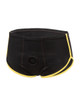 Side profile of CalExotics Boundless Black & Yellow Brief emphasizing the comfortable waistband, leg openings, and supportive brief-style fit for extended wear