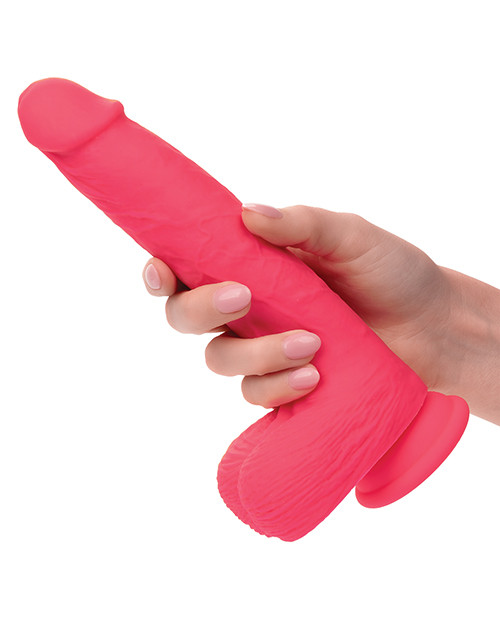 CalExotics Studs 7 inch Rumbling & Thrusting Silicone Dildo shown ready for use with powerful dual motion, 10 intense functions, strong suction cup base, IPX7 waterproof design, and USB rechargeable convenience for mind-blowing pleasure