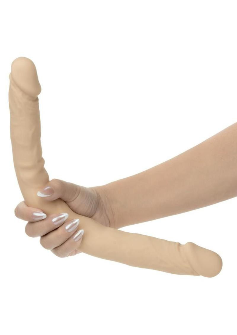 Side view of CalExotics Studs 16 inch dual-ended silicone dong showing full length and texture