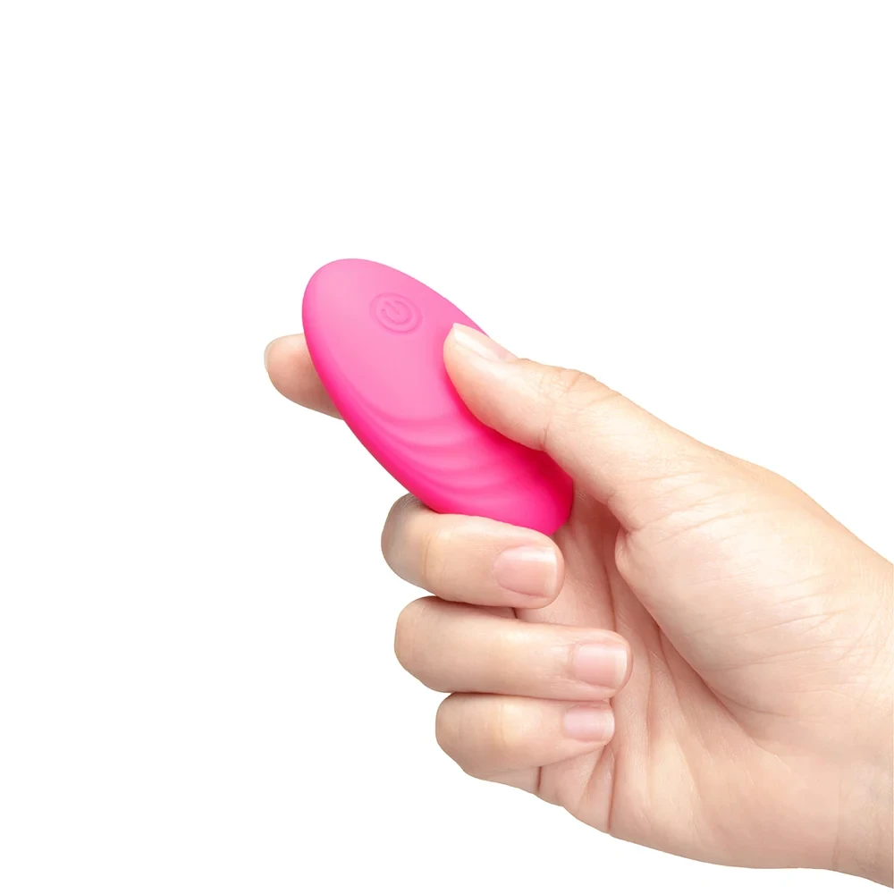Together Ménage à Trois wireless remote in hot pink silicone and ABS that controls all three vibrating eggs.