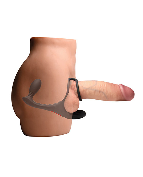 Full Triple Rush harness laid flat from the dual rings to the anal plug.