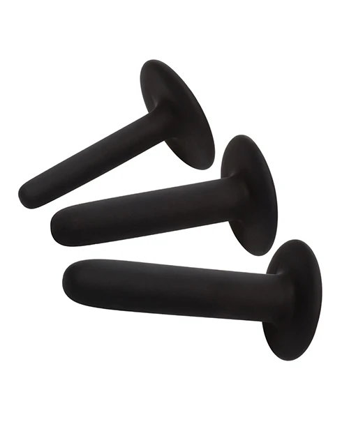 Three graduated curved black silicone pegging probes from CalExotics Boundless Silicone Pegging Kit arranged side by side showing progressive sizes for customizable strap-on play