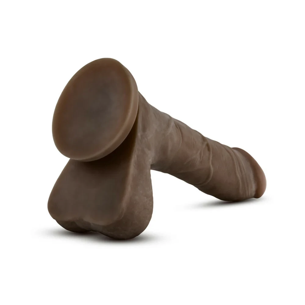 Powerful suction cup base close-up on Au Naturel Sensa Feel Mister Perfect providing secure hands-free suction and harness compatibility for versatile play
