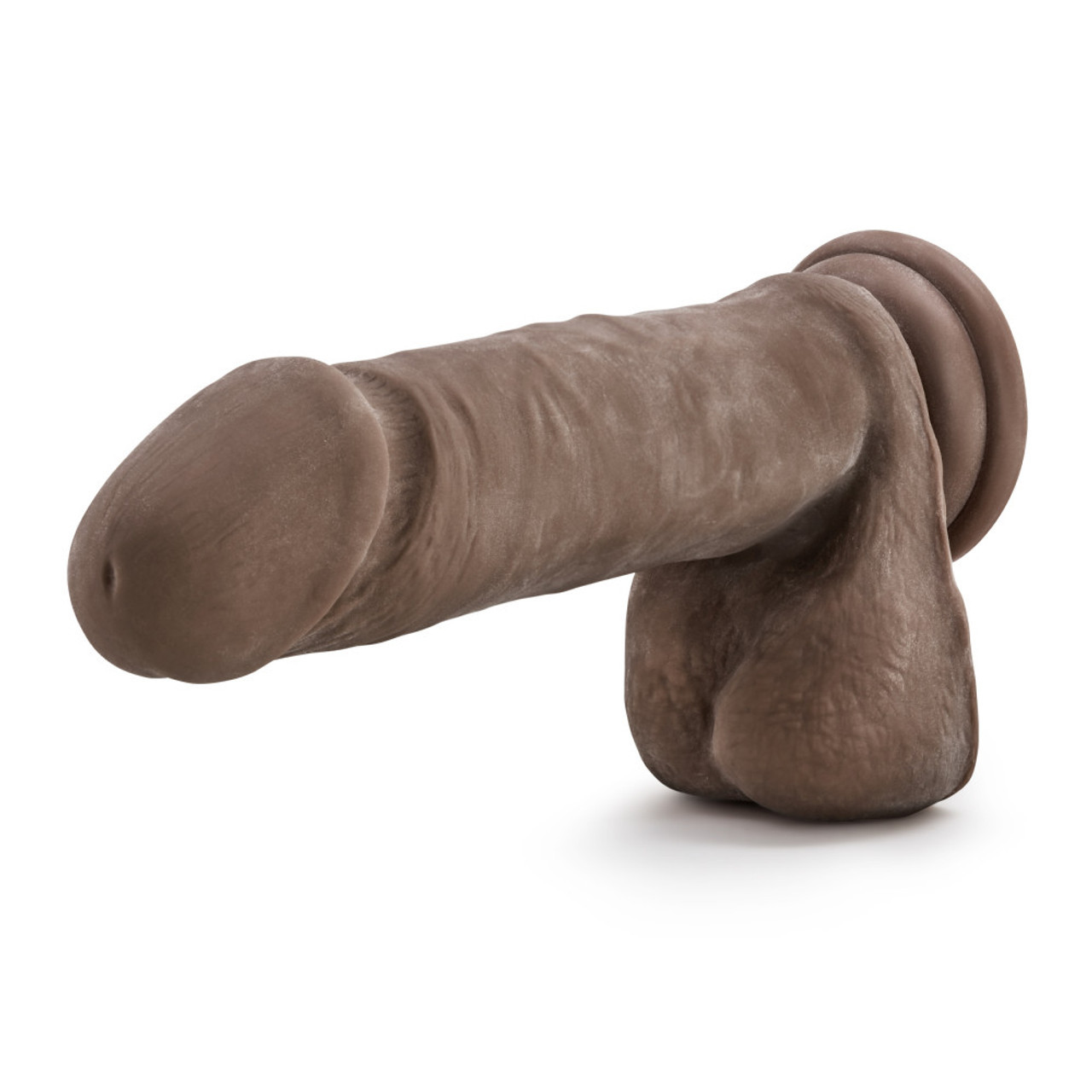 Close-up of the realistic detailed head on Au Naturel 9 inch Sensa Feel Dildo with soft dual density TPE skin for lifelike insertion and intense deep G-spot or prostate stimulation
