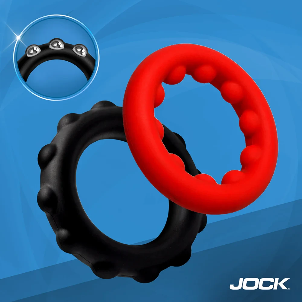 Full set of JOCK Enhancers Weighted Silicone C-Rings showing the red 1.1 inch and black 1.2 inch rings with internal metal beads for added weight and a fuller, thicker feeling erection