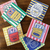 Colorful Sardine Coasters - Set of 6 Square Ceramic with Cork Backing and Metal Stand