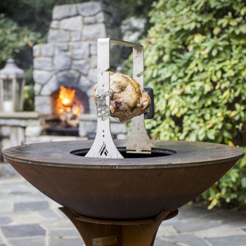 The Arteflame rotisserie fits perfectly in the center of the Arteflame grills allowing you to cook perfect chicken, turkey, kabobs, or hang foods from the top rack including dutch ovens or sausages and other meats. For the Classic, Euro and One 40 and One 30 grills, the rotisserie fits into the cooktop and mounts to the accessory ring. For use with the One 20, the cooktop is removed and the rotisserie is mounted instead.
This stainless steel system is made specifically to attach to the sear ring on the cooktop with just a simple squeeze and release.
This kit includes a cordless battery operated rotisserie motor, spit and one set of forks. The motor will turn up to 25lbs. The Arteflame rotisserie fits perfectly in the center of the Arteflame grills allowing you to cook perfect chicken, turkey, kabobs, or hang foods from the top rack including dutch ovens or sausages and other meats. For the Classic, Euro and One 40 and One 30 grills, the rotisserie fits into the cooktop and mounts to the accessory ring. For use with the One 20, the cooktop is removed and the rotisserie is mounted instead.
This stainless steel system is made specifically to attach to the sear ring on the cooktop with just a simple squeeze and release.
This kit includes a cordless battery operated rotisserie motor, spit and one set of forks. The motor will turn up to 25lbs.