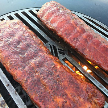 This carbon steel center grill grate fits flush into the Arteflame grill cooktops. The grill grate allows for easy grilling of seafood, steaks, burgers, veggies and more. It is a perfect addition and adds lots of extra grill space. Perfect for searing those steaks! Made of US Steel and virtually maintenance-free.
Note: When the grill grate arrives, the surface will be silver (unseasoned). It will develop the dark seasoned color shown in the images once it's been used several times and properly seasoned. This carbon steel center grill grate fits flush into the Arteflame grill cooktops. The grill grate allows for easy grilling of seafood, steaks, burgers, veggies and more. It is a perfect addition and adds lots of extra grill space. Perfect for searing those steaks! Made of US Steel and virtually maintenance-free.
Note: When the grill grate arrives, the surface will be silver (unseasoned). It will develop the dark seasoned color shown in the images once it's been used several times and properly seasoned.