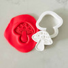 Toadstool cookie stamp and cutter set with red fondant impression Toadstool cookie stamp and cutter set with red fondant impression