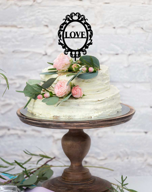 LOVE framed acrylic cake topper - the word "Love" laser cut in a frame