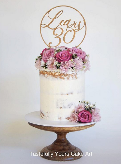 Stunning circular cake topper personalised with name and age.  Made in Australia.