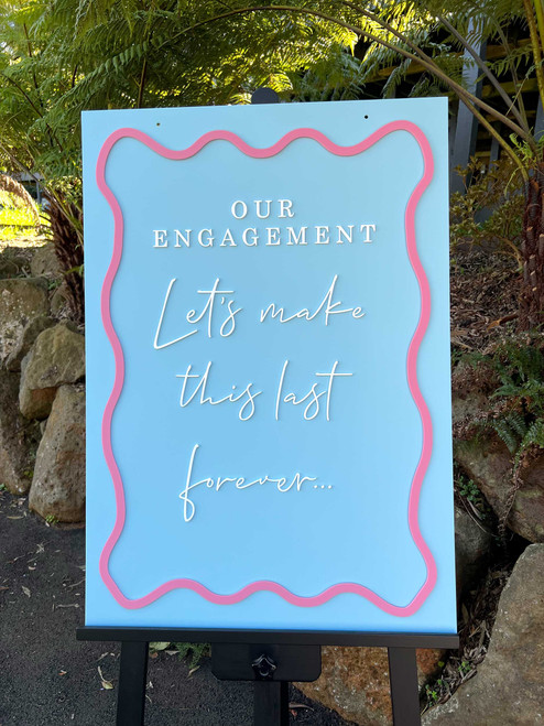 Custom Event Signage with Elegant Wavy Frame and 3D Script Text Custom Event Signage with Elegant Wavy Frame and 3D Script Text