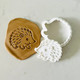 Echidna cookie stamp pressed into brown fondant