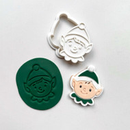 Decorated Elf fondant topper with green hat and collar